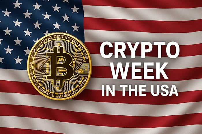Bandera de EE. UU. ondeando, con una moneda de Bitcoin dorada en primer plano y el texto “Crypto Week in the USA” en letras blancas.